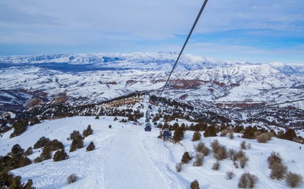 In Central Asia, accessing back country runs is possible with ski lifts